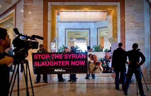 24 février : conférence internationale des amis du peuple syrien à Tunis avec 60 MAE. dans le hall de l'hotel association syrien ...