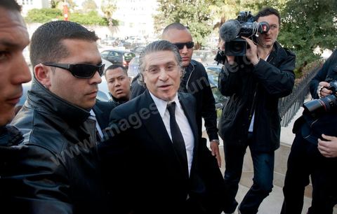 19 avril 2012 : arrivée très médiatique de Nabil Karoui à son procès au tribunal de première instance de Tunis avec son frère Ghazi et l'un de ses avocats.