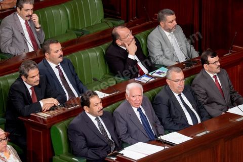 06 août 2013 : le Premier Ministre et les ministres régaliens à la première séance de l'Assemblée depuis l'assassinat du député Mohamed Brahmi. La séance plénière débute par un long hommage au martyr avec prières et discours en présence des députés, hormis les 57 en retrait, du Premier Ministre et des ministres de l'Intérieur et de la Défense qui par leurs discours exposeront la situation dans le pays.