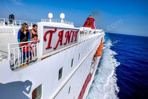 Passengers on the bridge in the approach of Tunisia. Aboard the new vessel Tanit de la CTN (Tunisian Company of Navigation) going Marseille to Tunis. The return of the Tunisian immigrants in France every summer represents a tourist and financial basket very important for Tunisia. The number of Tunisians of the foreigner would be close to 1,5 millions that is 13 % of the Tunisian population, are 60 % to be lived in France and 82 % in Europe, The summer represents 55 % of the 1,75 million Tunisians' annual entrances of the foreigner.