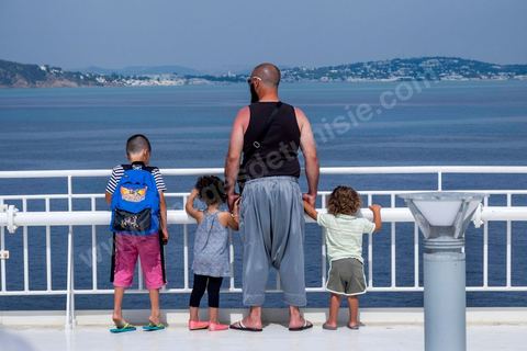 Passengers on the bridge in the approach of Tunisia. Aboard the new vessel Tanit de la CTN (Tunisian Company of Navigation) going Marseille to Tunis. The return of the Tunisian immigrants in France every summer represents a tourist and financial basket very important for Tunisia. The number of Tunisians of the foreigner would be close to 1,5 millions that is 13 % of the Tunisian population, are 60 % to be lived in France and 82 % in Europe, The summer represents 55 % of the 1,75 million Tunisians' annual entrances of the foreigner.