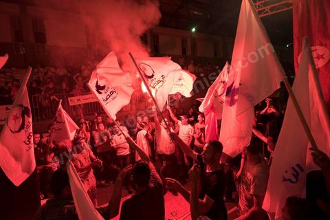 17 octobre 2014 : meeting du parti islamiste Ennahdha dans la salle des sports du quartier populaire de Ezzouhour, banlieue ouest de Tunis, pour laprésentation de la liste Tunis 1 dirigée par Ali Larayedh, ancien ministre de l'intérieur et Premier ministre, pour la campagne électorale des élections législatives du 26 octobre. 