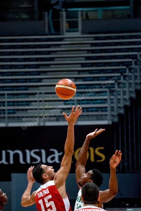23 août 2015 : Salah Mejri, la fameux n°15 de la Tunisie domine de ses 2,17m le jeu, il vient d'être recuté par les Mavericks de Dallas et devient le premier joueur arabe en NBA. Dernier match de poule de la Tunisie contre le Nigéria lors de l'AfroBasket Tunisia 2015. Victoire de la Tunisie (70-59) et finie première de son groupe.
