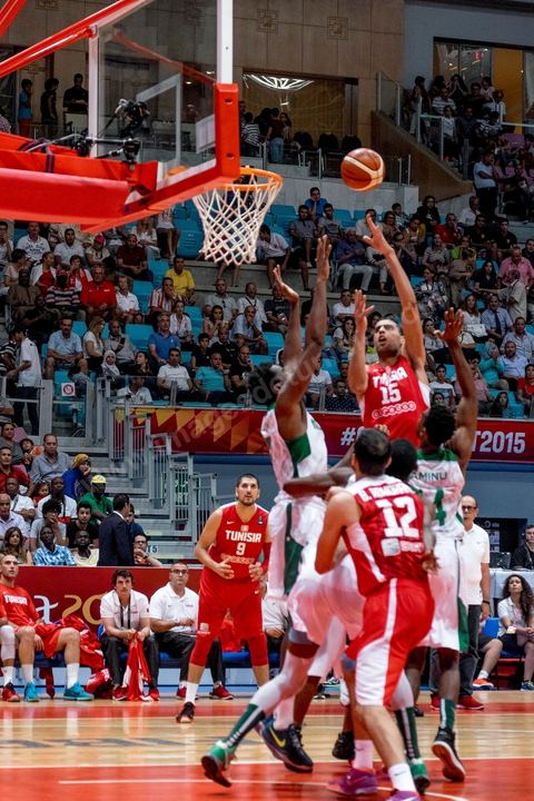 23 août 2015 : Salah Mejri, la fameux n°15 de la Tunisie domine de ses 2,17m le jeu, il vient d'être recuté par les Mavericks de Dallas et devient le premier joueur arabe en NBA. Dernier match de poule de la Tunisie contre le Nigéria lors de l'AfroBasket Tunisia 2015. Victoire de la Tunisie (70-59) et finie première de son groupe.