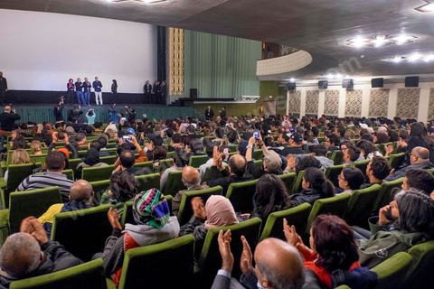 26 novembre 2015 : Dans le cadre des JCC, Journées Cinématographiques de Carthage, Festival du film arabo-africain, à Tunis, première projection dans un pays musulman du film "Much Loved" du réalisateur marocain Nabil Ayouch. Deux jours après l'attentat terroriste contre un bus de la police présidentiel à quelques centaines de mètres des salles de cinéma des JCC, la projection de "Much Loved" devenait un double défi. Le directeur des JCC Brahim Eltaief et Nabil Ayouch ont tenu à maintenir sa programmation comme l'ensemble de celle du fetsival. La salle se remplit de plus d'un millier de cinéphiles pour rencontrer Nabil Ayouch et voir en avant première arabe l'excellent film qui expose cruement mais avec grand talent la réalité des prostitués marocaines. La projection fut suivie d'une conférence de presse.