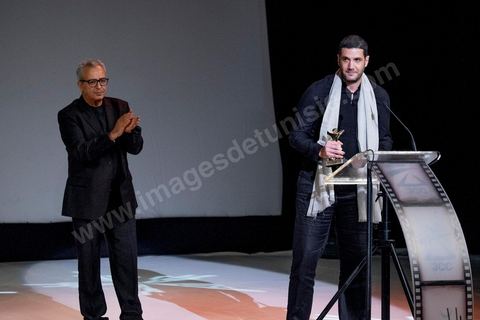 28 novembre 2015 : Prix du Jury à Nabil AYouch, réalisateur marocain du film "Much Loved". Cérémonie de cloture des JCC au théâtre municipal de Tunis au coeur de la capitale meutrie il y a quelques jours à peine par une attaque suicide terroriste qui a fait 12 morts parmis les policiers de la garde présidentielle. La cérémonie avancée pour cause de couvre feu a été un moment d'hommage à la culture qui a su faire face à la terreur durant cette semaine et l'occasion de primée les artistes et réalisateur du monde arabo-africain. 