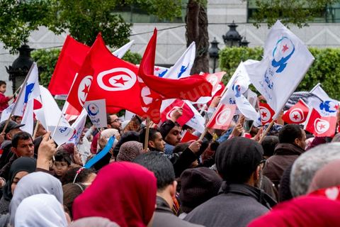 January 14, 2017: The Ennahda Party organized a large stage event featuring clowns, singers, and speeches by party leaders. Tunisians celebrated the 6th anniversary of the Revolution on Habib Bourguiba Avenue in Tunis amid a certain sense of gloom. Few political leaders and organizations in Tunisia marked the sixth anniversary of the January 14, 2011, revolution on Saturday, as a sense of disillusionment is spreading across the country.
