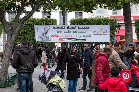 January 14, 2017: Pro-Palestine booth. Tunisians celebrate the 6th anniversary of the Revolution with a certain sense of gloom on Habib Bourguiba Avenue in Tunis. Few political leaders and organizations in Tunisia marked the 6th anniversary of the January 14, 2011, revolution on Saturday, as a sense of disillusionment is spreading across the country.
