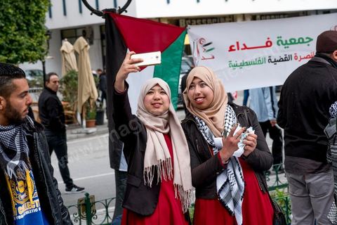 January 14, 2017: Pro-Palestine booth. Tunisians celebrate the 6th anniversary of the Revolution with a certain sense of gloom on Habib Bourguiba Avenue in Tunis. Few political leaders and organizations in Tunisia marked the 6th anniversary of the January 14, 2011, revolution on Saturday, as a sense of disillusionment is spreading across the country.
