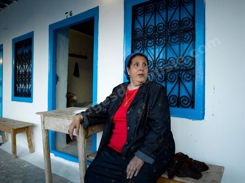 Scène de pélérins dans le caravanserail de la synagogue de la Ghriba durant le pelerinage juif annuel au village de Erriadh ou Hara Sghira sur l'ile de djerba