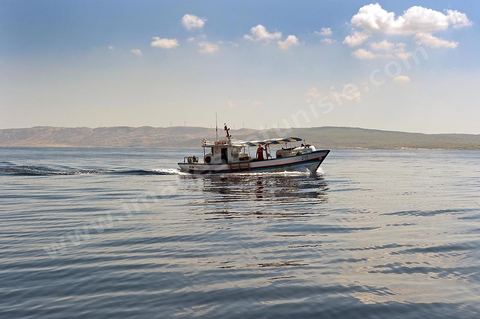 Pêcheur rentrant ua port de Bizerte