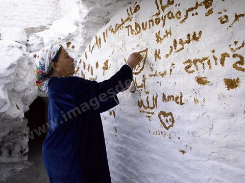 Le sanctuaire de la Mokhola est un lieu saint situé dans les citernes romaines d'Aïn El Hammam sur le site archéologique romain de Dougga. Le lieu est encore vénéré par les habitants de la région qui viennent y prier et chaque année faire des sacrifices. La paroi intérieure de la citerne, située à l'entrée du couloir de canalisation, est couverte de chaux et d'écriture au henné. Dans la grotte sombre les habitants viennent tout au long de l'année faire des offrandes et des voeux.