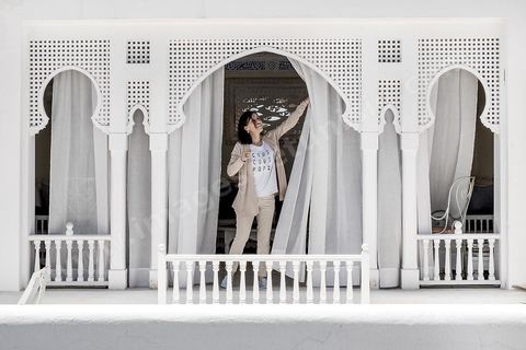 Leila Ben Gacem in the patio of the Dar Ben Gacem. This house was constructed in the 17th century, and was renovated from 2010 to 2013. Today it is a 7 room Boutique Hotel. Restoration work was lead by ASMTunis and decoration and furnishing shows the Tunisian traditional arts & crafts.