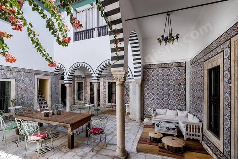 B&B Dar Ben Gacem. Dar Ben Gacem was constructed in the 17th century, and was renovated from 2010 to 2013. Today it is a 7 room Boutique Hotel. Restoration work was lead by ASMTunis and decoration and furnishing shows the Tunisian traditional arts & crafts.
