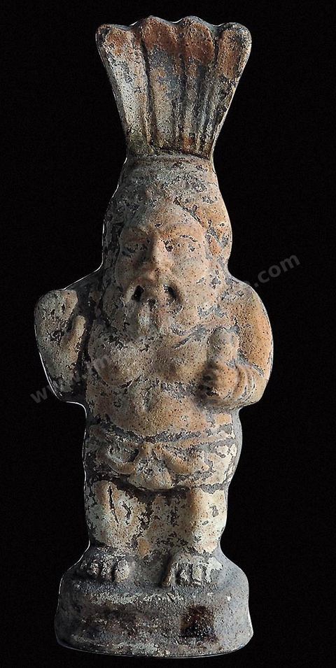 Statuette en terre cuite du dieu Bès, censé protéger contre les êtres nuisibles et assister les femmes enceintes (musée du Bardo). section punique - musée du Bardo